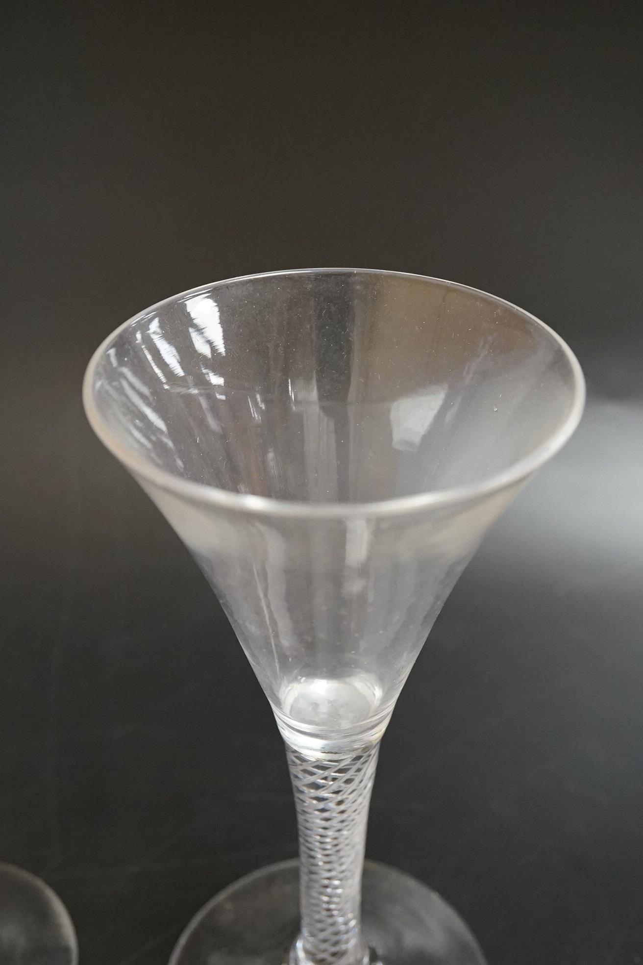 Two air twist stem funnel bowl wine glasses, c.1745, tallest 18.5cm high